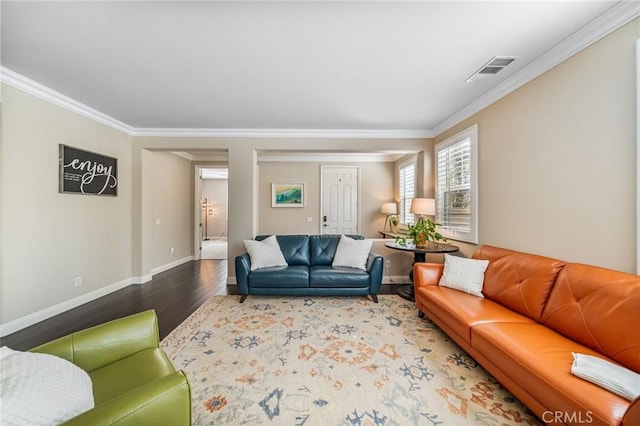 living room featuring crown molding and hardwood / wood-style floors