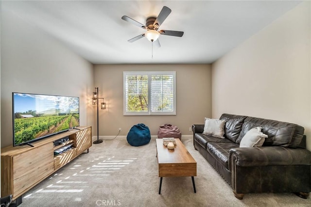 living room with carpet flooring and ceiling fan