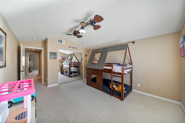 rec room with ceiling fan, light colored carpet, and lofted ceiling