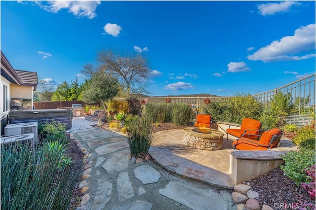 view of patio / terrace featuring a fire pit