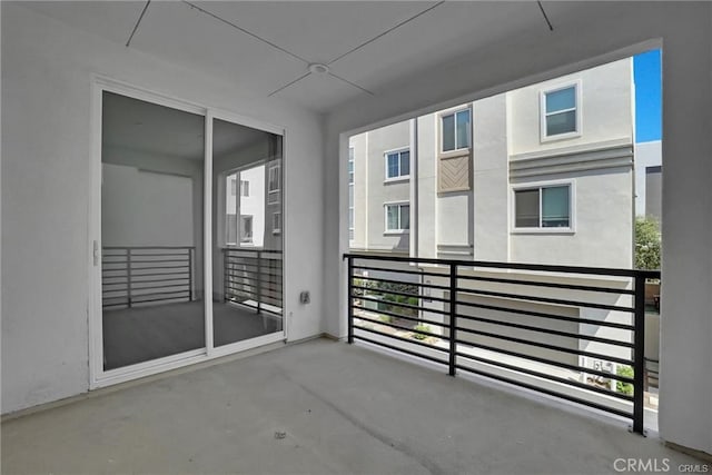 balcony featuring ceiling fan