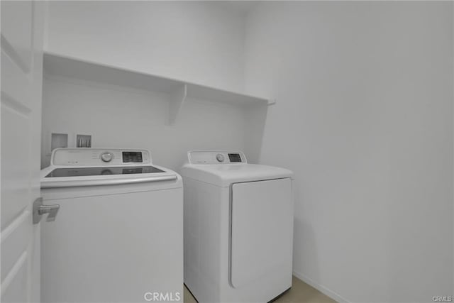 laundry area featuring washing machine and dryer