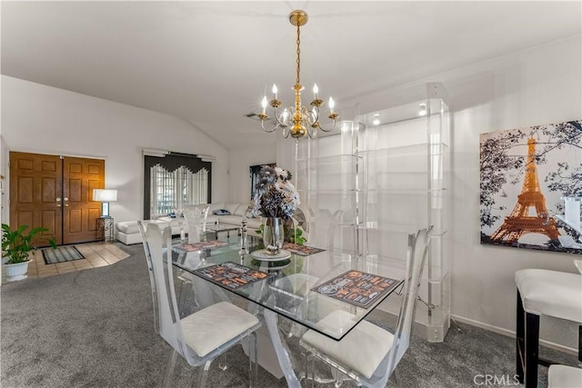 carpeted dining space featuring lofted ceiling and a notable chandelier