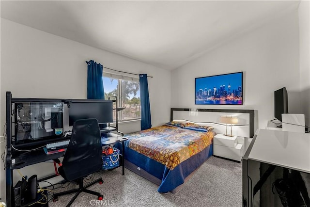 bedroom with lofted ceiling