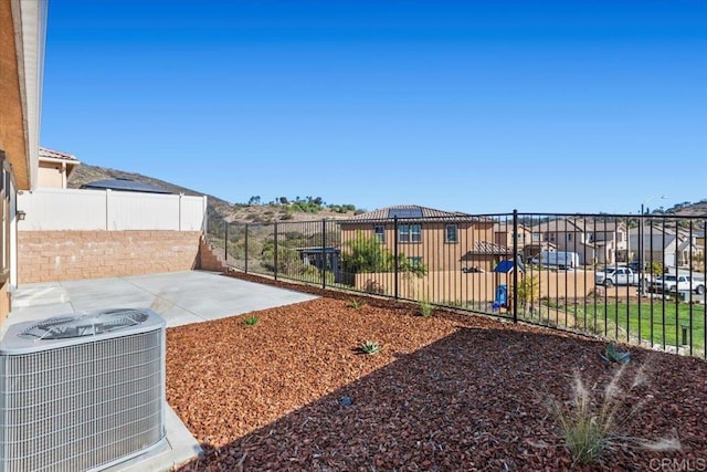 view of yard with a patio and cooling unit