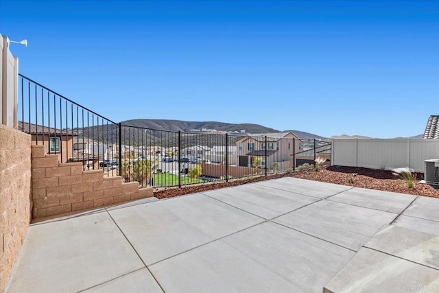 view of patio / terrace with a mountain view