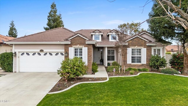 view of front facade featuring a garage and a front lawn