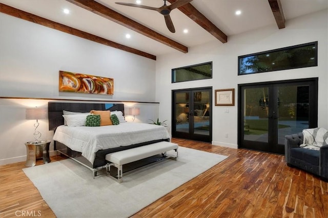 bedroom with recessed lighting, wood finished floors, baseboards, access to outside, and french doors