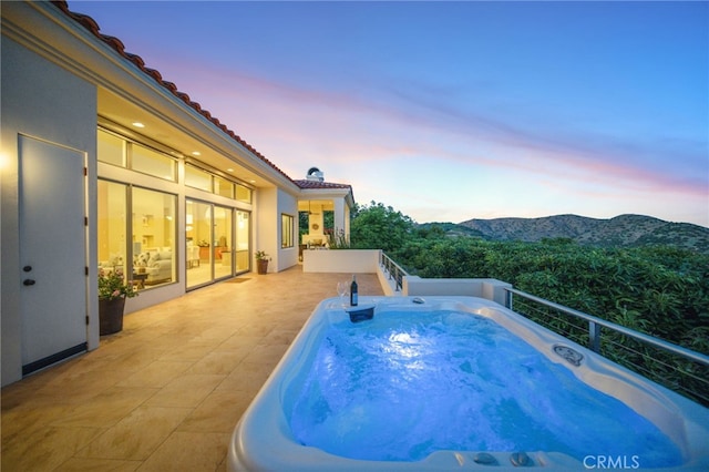 view of swimming pool featuring a mountain view