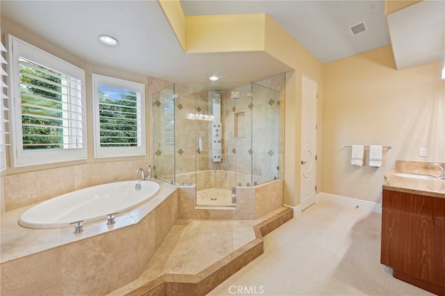 full bathroom featuring a garden tub, vanity, visible vents, and a stall shower