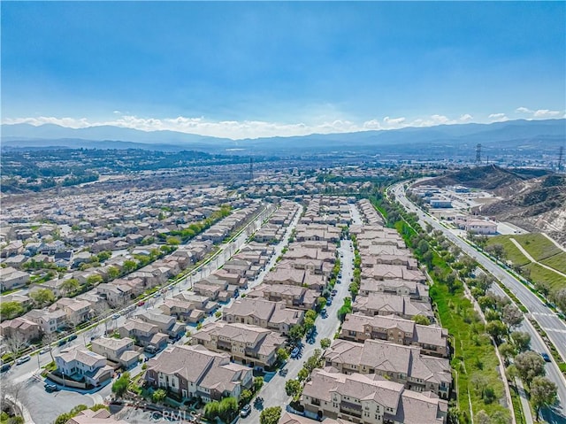 birds eye view of property with a residential view and a mountain view