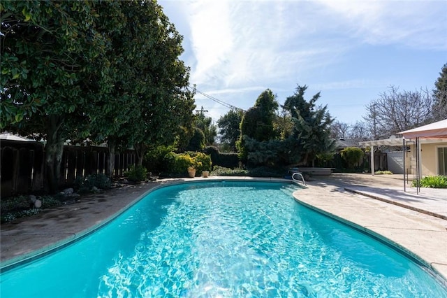 view of pool featuring a pergola and a patio