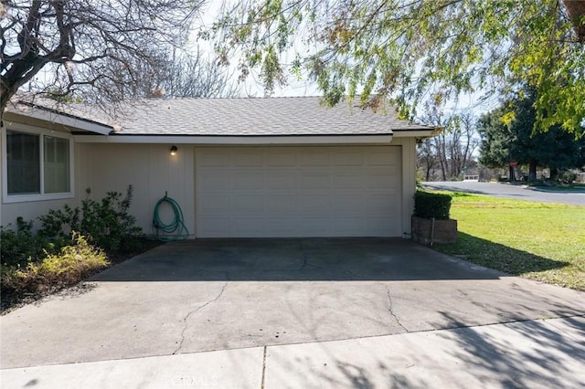 garage with a yard