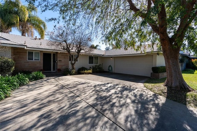 single story home featuring a garage