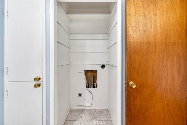 clothes washing area with hookup for an electric dryer