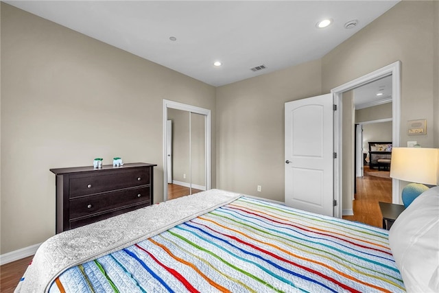 bedroom featuring hardwood / wood-style flooring