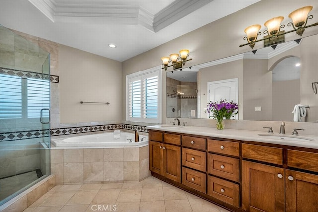 bathroom featuring vanity, tile patterned floors, ornamental molding, and separate shower and tub