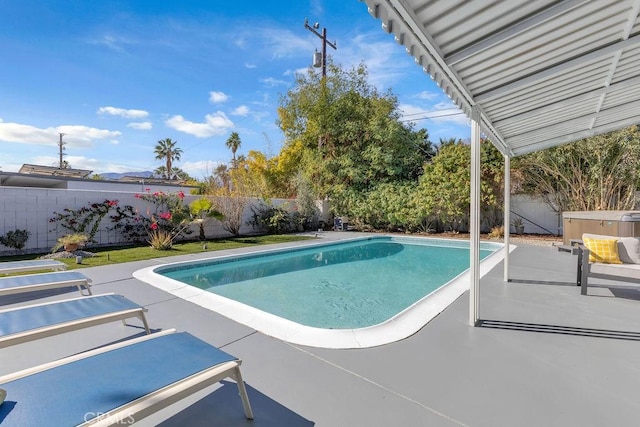 view of pool with a patio area, a fenced in pool, and a fenced backyard