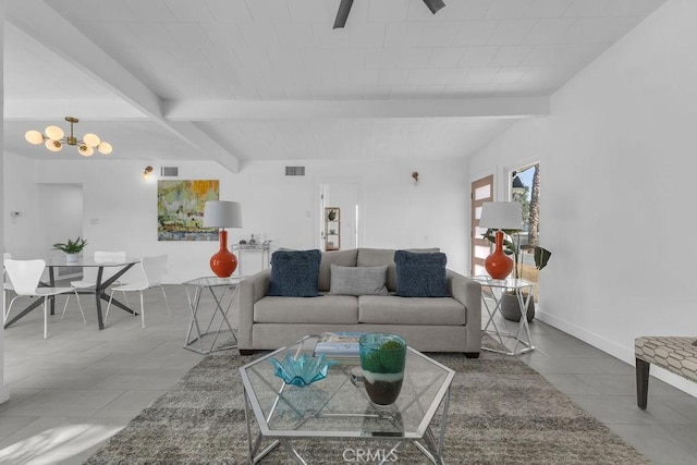 living room featuring beamed ceiling, a notable chandelier, baseboards, and visible vents