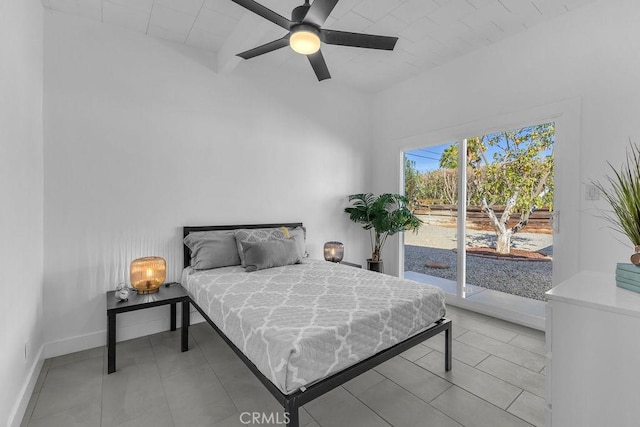 bedroom with baseboards, beam ceiling, light tile patterned flooring, ceiling fan, and access to exterior