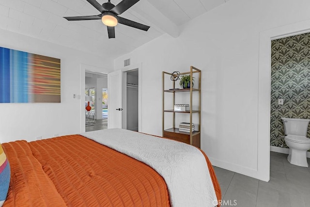 tiled bedroom featuring visible vents, beamed ceiling, a ceiling fan, and baseboards