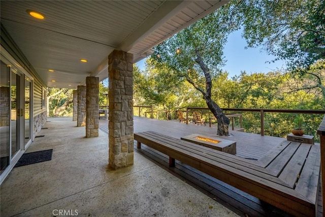 exterior space featuring an outdoor fire pit