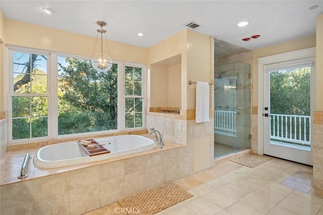 full bathroom featuring visible vents, tile patterned flooring, a shower stall, a bath, and recessed lighting