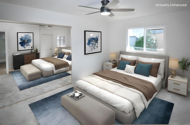 bedroom with ceiling fan, a closet, and multiple windows