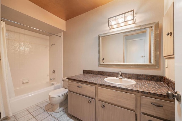 full bathroom featuring tile patterned flooring, vanity, toilet, and shower / tub combo with curtain