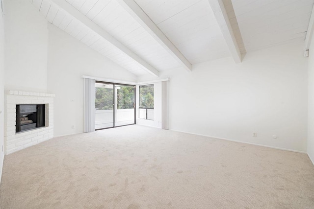 unfurnished living room with beamed ceiling, carpet flooring, a fireplace, and high vaulted ceiling