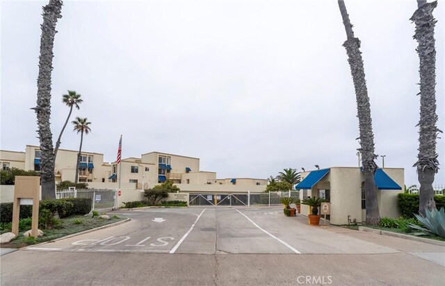 711 Pacific Coast Unit 313, Huntington Beach, CA 92648 - view of road featuring curbs