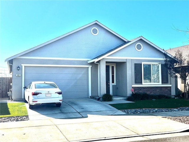 ranch-style house featuring a garage