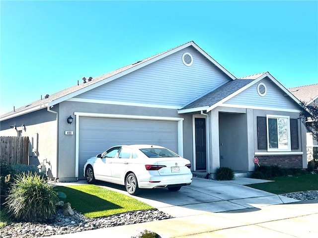 ranch-style home with a garage