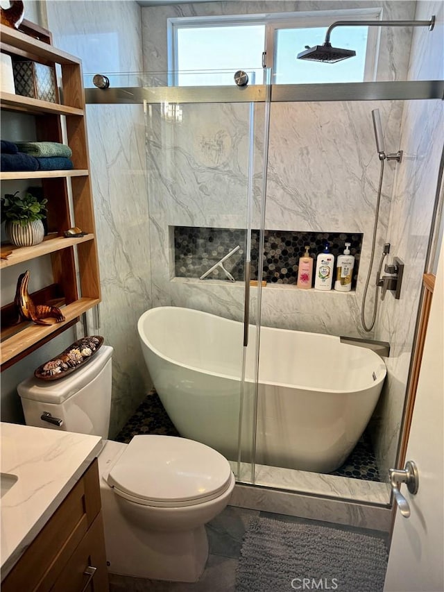 full bathroom featuring toilet, vanity, shower with separate bathtub, and tile walls