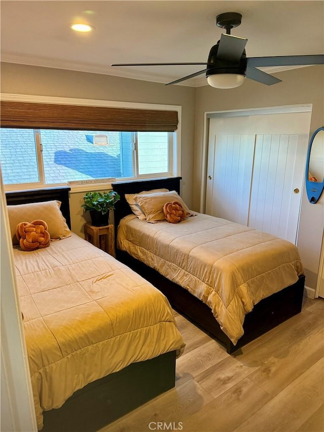 bedroom featuring recessed lighting, wood finished floors, and ceiling fan