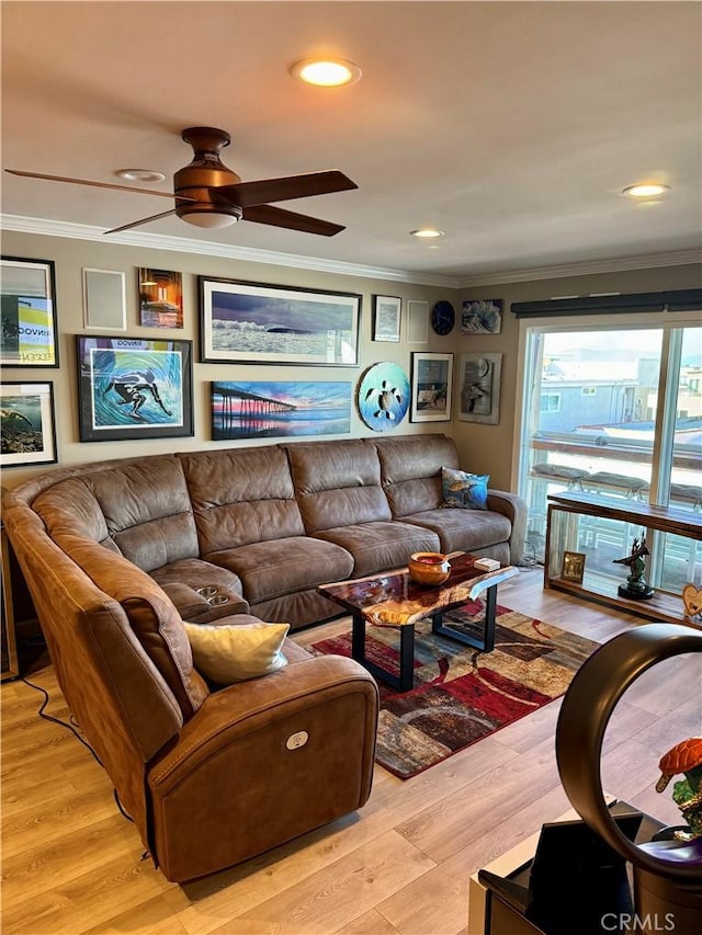 living room with recessed lighting, light wood-type flooring, ceiling fan, and ornamental molding