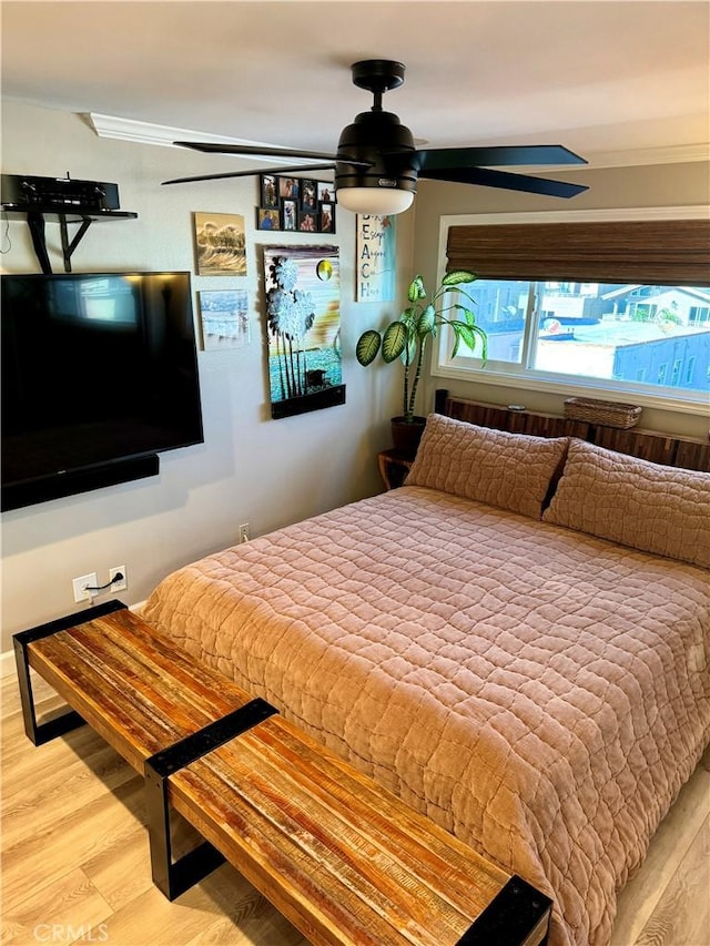 bedroom featuring wood finished floors