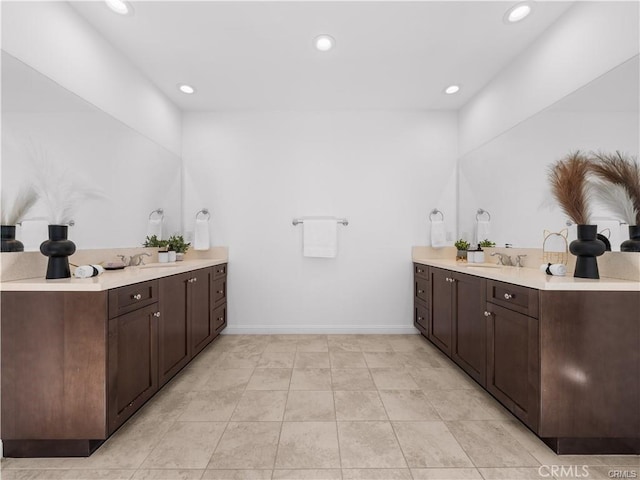 bathroom featuring vanity and tile patterned flooring