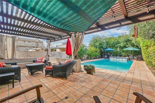 view of swimming pool featuring a fenced in pool, fence, a patio area, outdoor lounge area, and a pergola