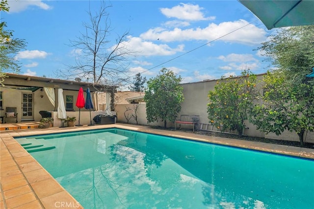 view of pool with a fenced backyard and a fenced in pool