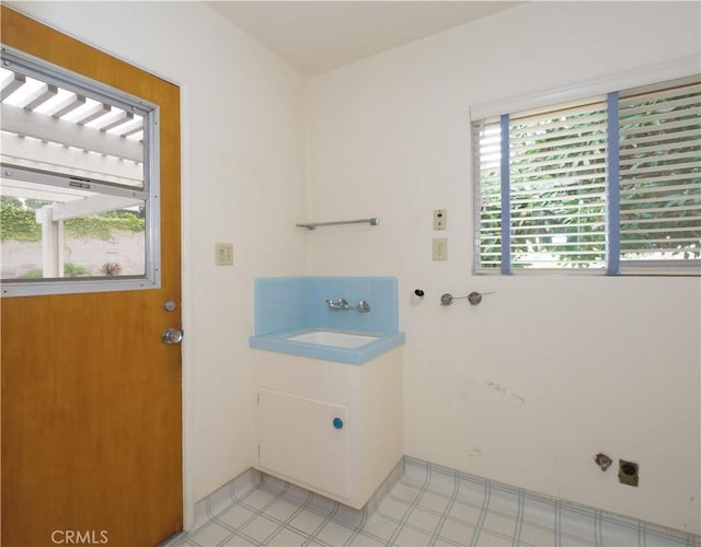 laundry room with sink