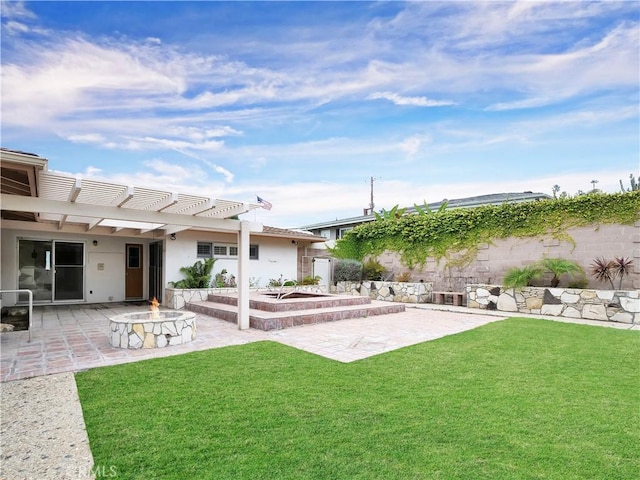 view of yard featuring a pergola, a patio, and an outdoor fire pit