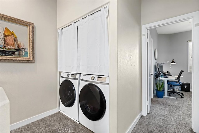 laundry area with independent washer and dryer and carpet