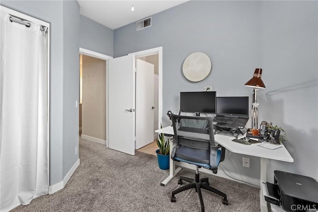 home office featuring light colored carpet