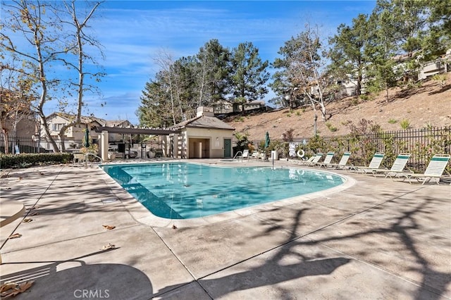 view of swimming pool featuring a patio