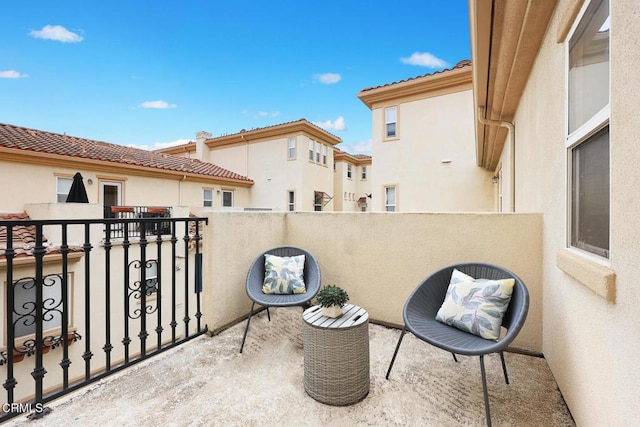 view of patio with a balcony