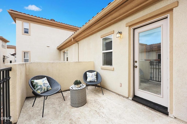 view of patio / terrace featuring a balcony