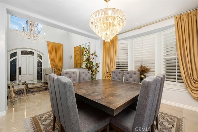 28622 Point Loma, Laguna Niguel, CA 92677 - dining space with a chandelier and baseboards