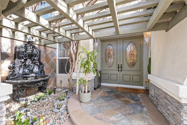 28622 Point Loma, Laguna Niguel, CA 92677 - doorway to property featuring stucco siding and a pergola