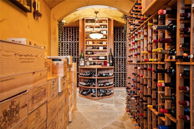28622 Point Loma, Laguna Niguel, CA 92677 - wine cellar featuring stone flooring and arched walkways